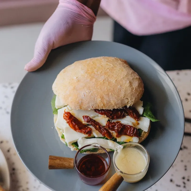 Burger served with hot chips