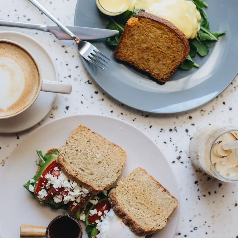 Open toasts served with a cappuccino